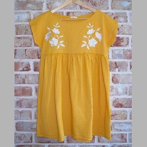 Yellow GU Japan babydoll mini dress, white embroidered flower detail size S